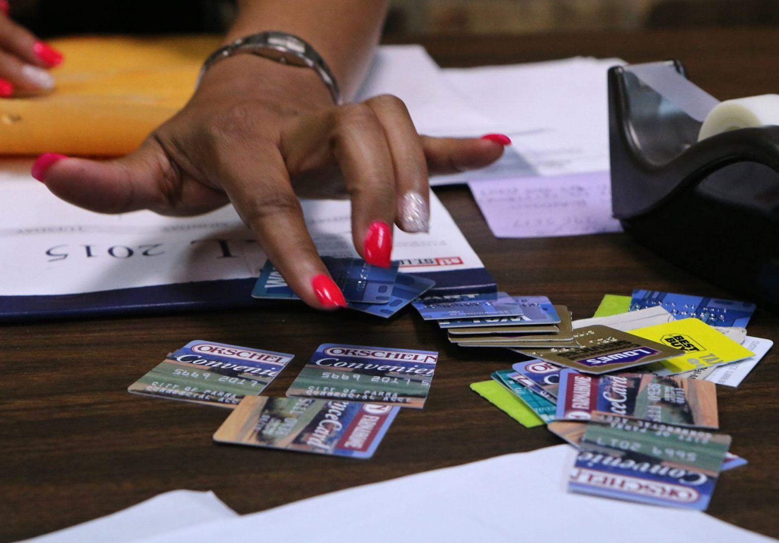 New Parma mayor displays cut-up city credit cards